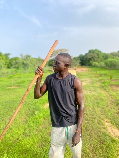 Mamadou dans son champ